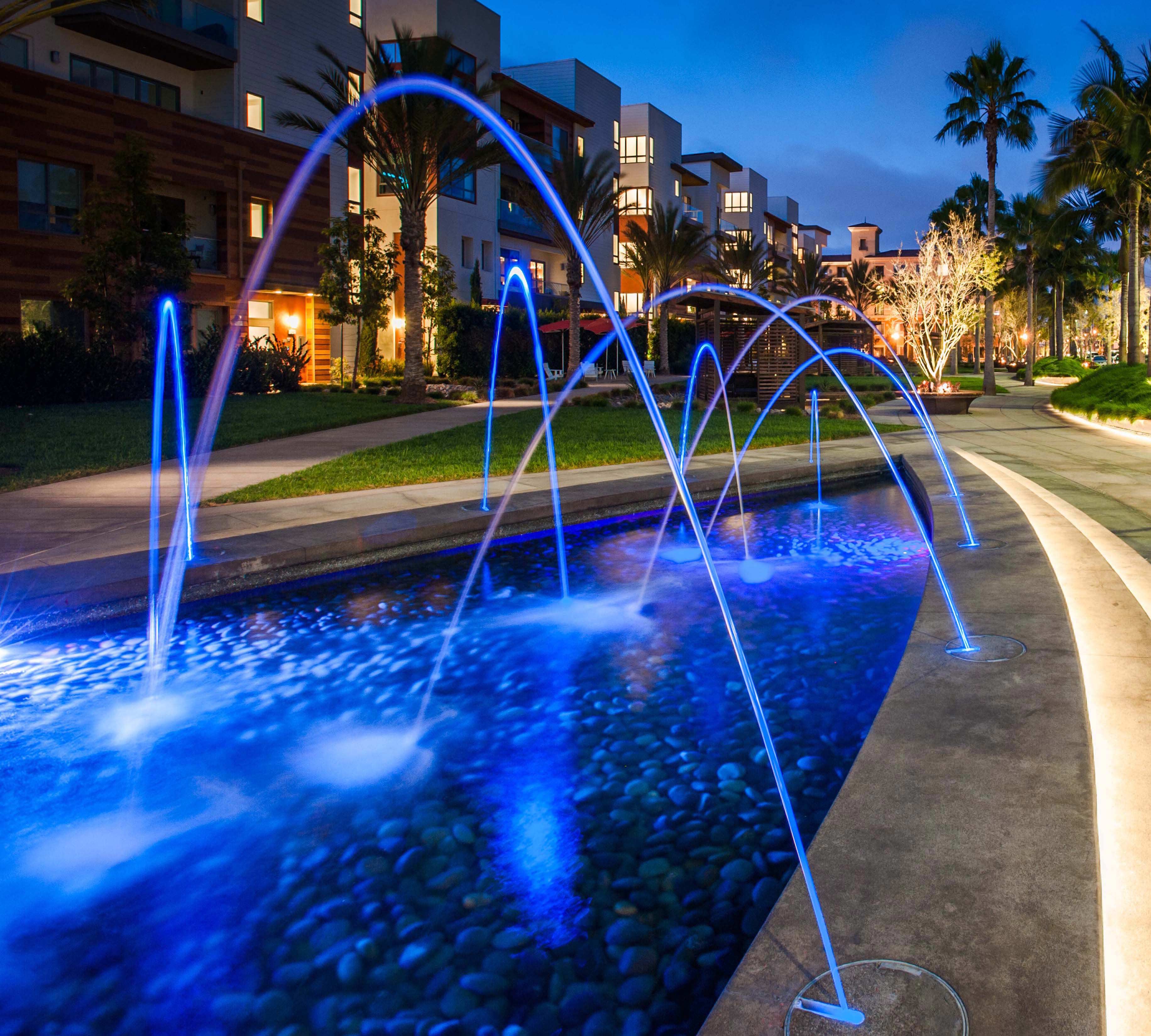 Community Development Water Spouts at night